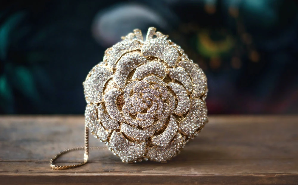 TRISH SCULLY ROSE GOLD CLUTCH